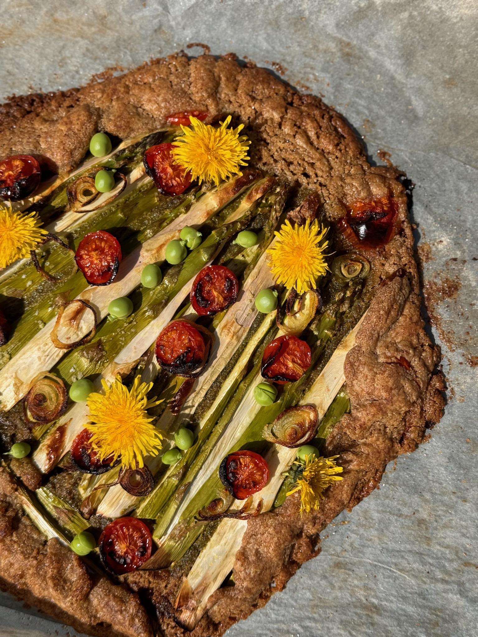 Spring Tart with Asparagus, Pesto, Peas & Tomato (Buckwheat-Almond Crust)